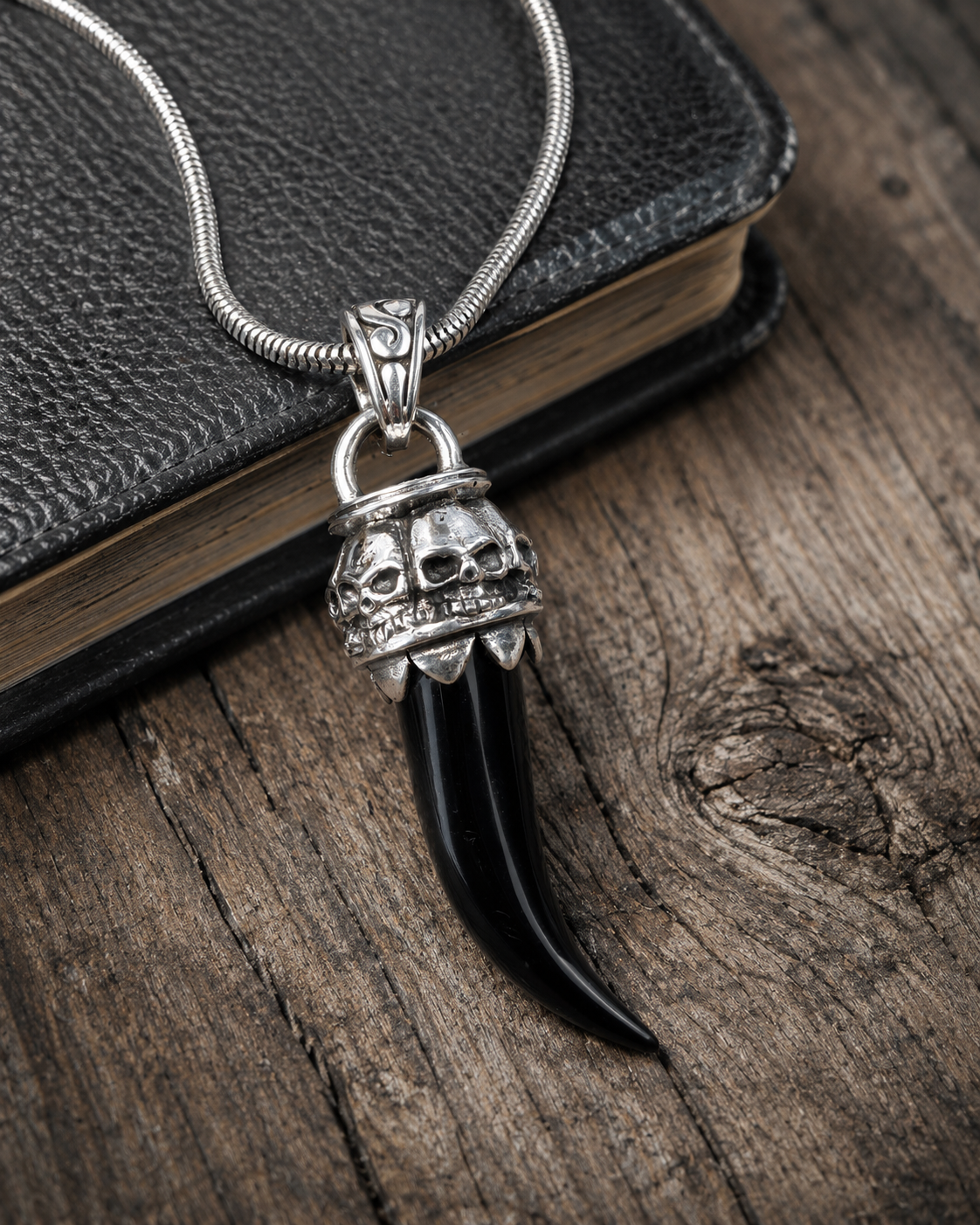 Sterling Silver Black Onyx Skull Fang Pendant