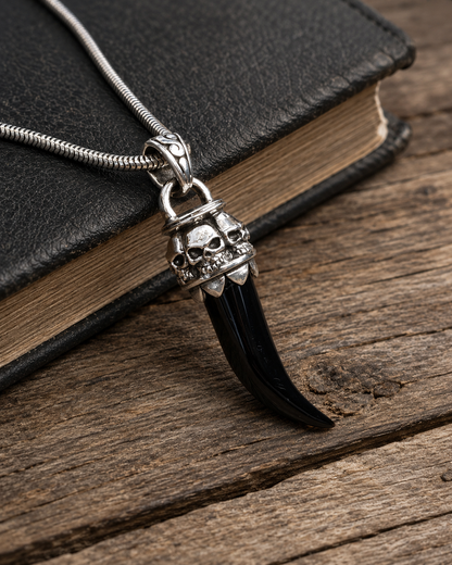 Sterling Silver Black Onyx Skull Fang Pendant