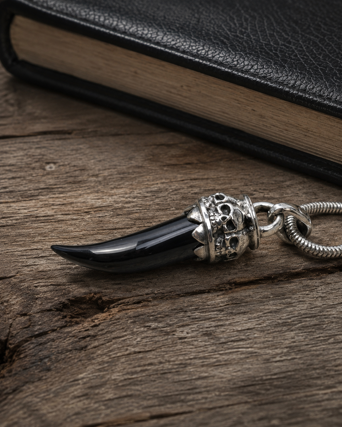 Sterling Silver Black Onyx Skull Fang Pendant