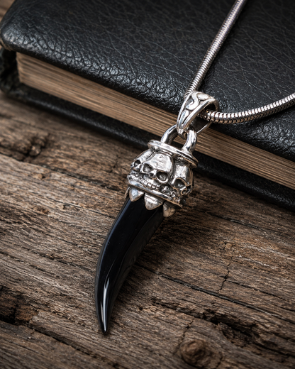 Sterling Silver Black Onyx Skull Fang Pendant